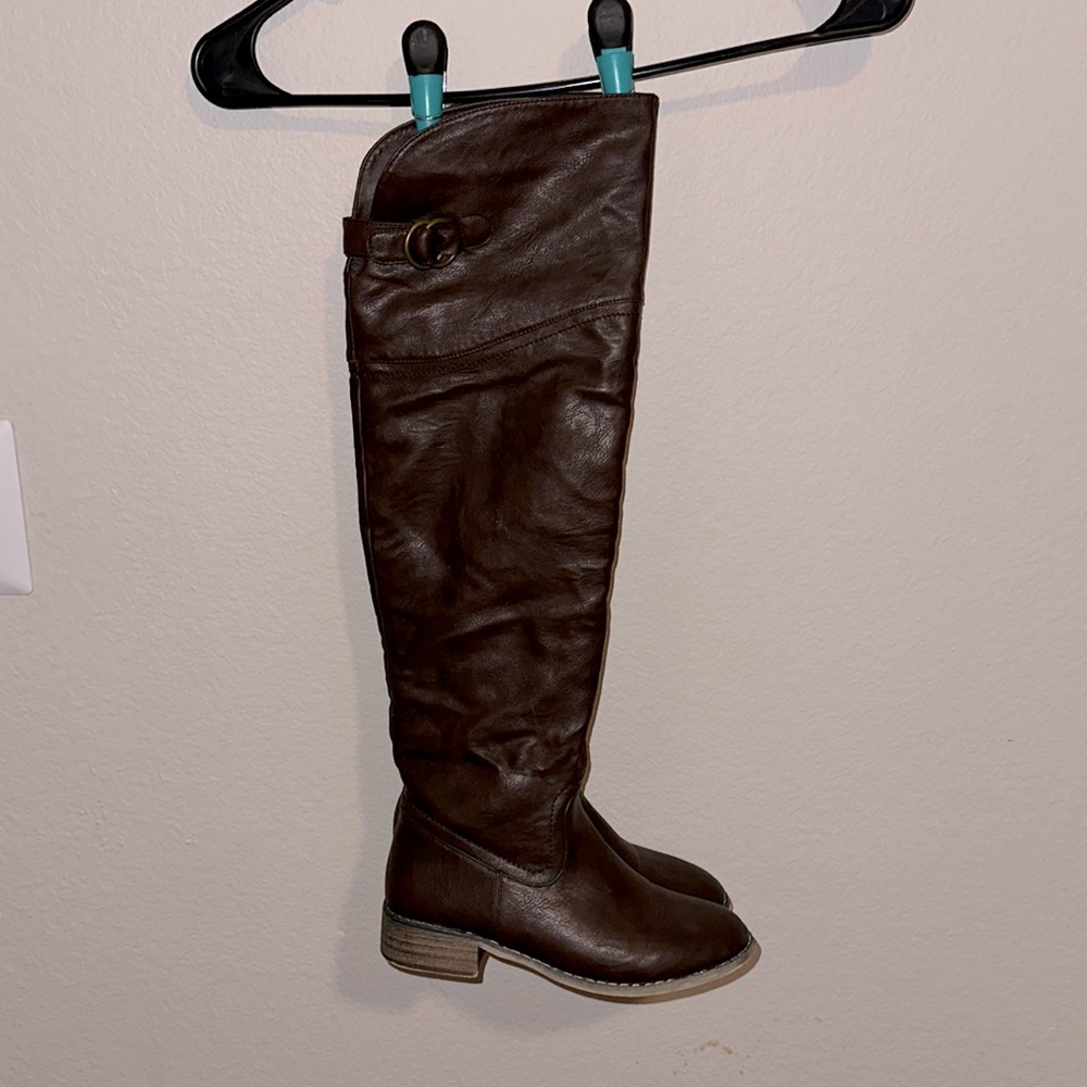 Slightly higher than knees length boots